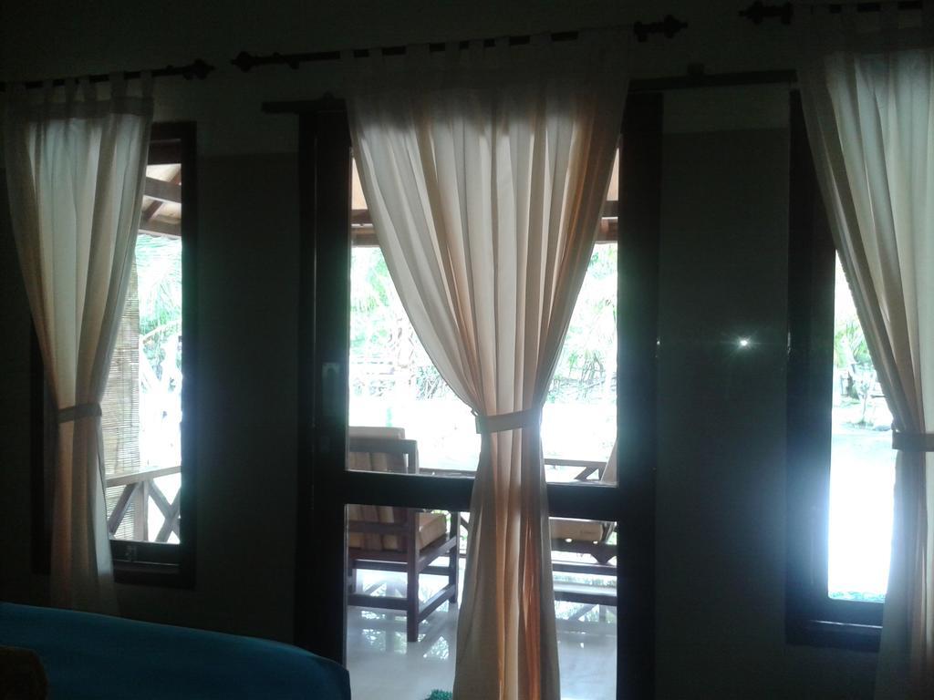 Fantastic Cottages Gili Meno Exterior foto