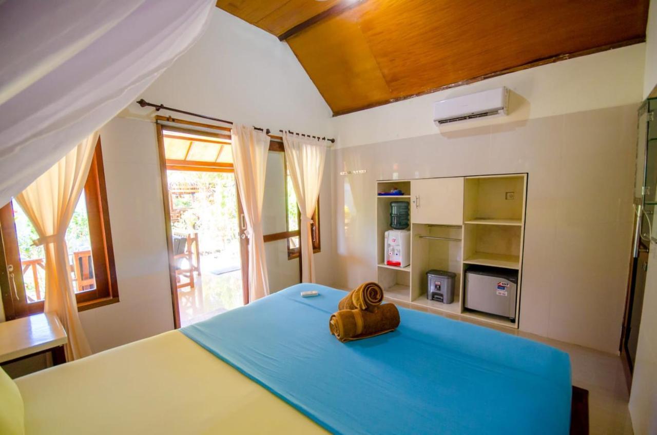 Fantastic Cottages Gili Meno Exterior foto